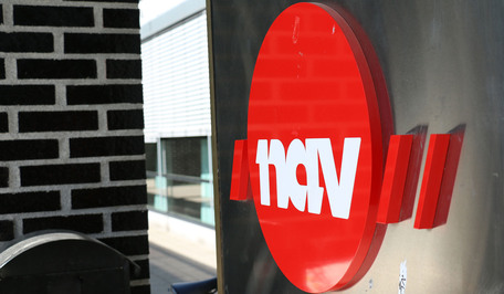 Nav-logo på vegg
